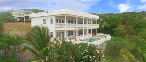 Private, 4000 sqft, on a hill overlooking the Atlantic Ocean. Stunning views .
