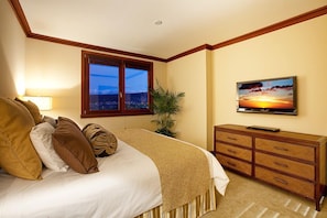 Master bedroom features king bed, 42 inch Sony Bravia, DVD Player, and iPod dock