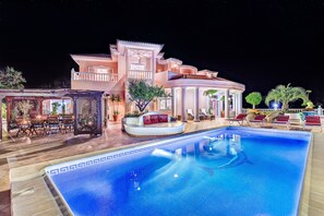 Villa & pool by night. The pool is heated to 29c all year round.