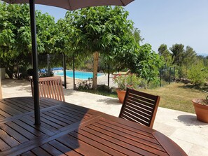 View of the terrace and pool from the gite