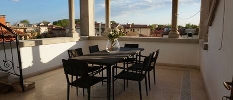 This beautiful private terrace is the perfect place to enjoy a meal or drink.