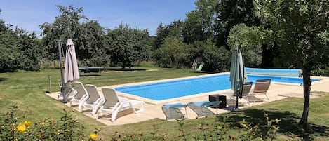 Heated, private pool in large garden. Table tennis, tree house, boules, swings.