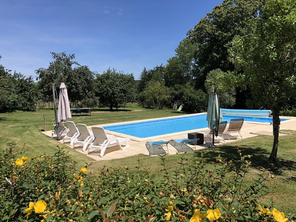 Heated, private pool in large garden. Table tennis, tree house, boules, swings.