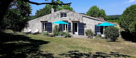 Beautiful, spacious cottage and gardens on a typically wonderful summer day.