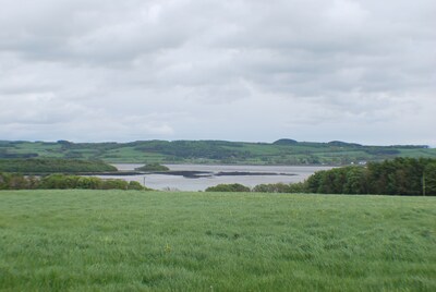 Cottage with stunning views over Kirkcudbright Bay, a short walk from the beach.