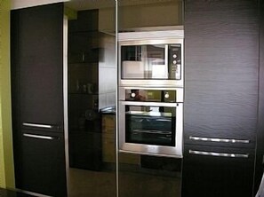 Kitchen details Fridge, freezer,microwave & cooker