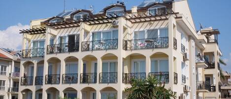 Apartment block front and side view from promenade