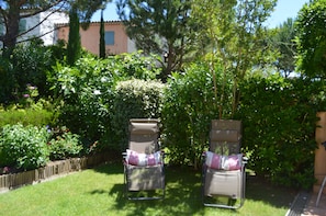 loungers in private garden area