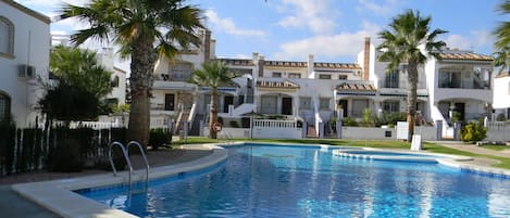 Looking across the pool to the apartment