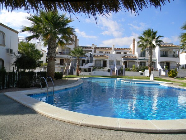 Looking across the pool to the apartment