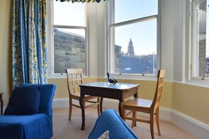 Large bay window with sunny westward facing views 