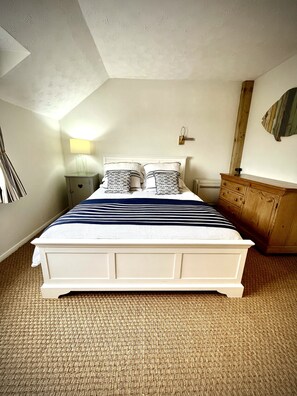 The second bedroom has a King Sized bed with Tempura mattress and a bunk bed. 