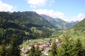 View on the valley, village and waterfall