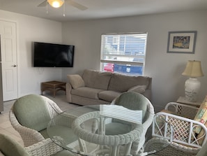 Sunshine Nook Living Room With Queen Size Hide a Bed.