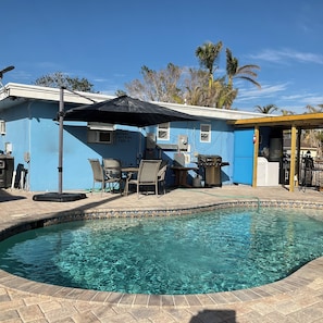 Grill and Table by the Heated Pool