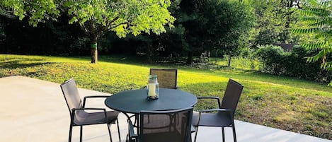 table on terrace with view over the garden