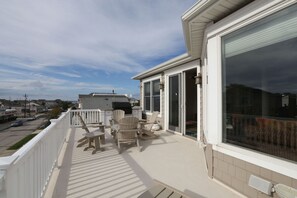 3rd floor deck, grill and seating area