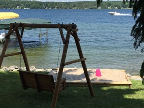 Large sand box and swing.
