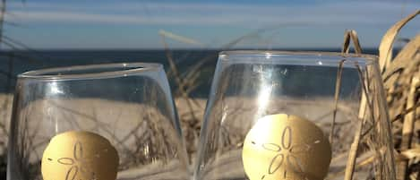 Enjoy your favorite drink by the ocean while staying at Surfside Cottages