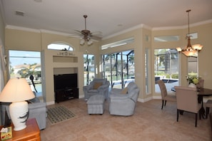 Family room with TV and Amazon 'Alexa'. Speakers wired throughout house.