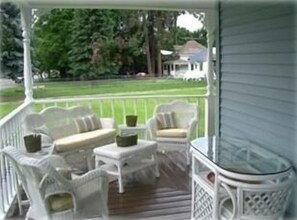 Inviting wrap around front porch perfect for morning coffee &  afternoon drinks.