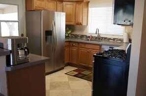All new kitchen, Bosch and Kenmore Elite appliances, concrete countertops.