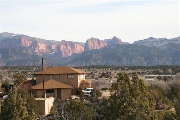 View of the house from across our property with Kolob Canyon in the background.