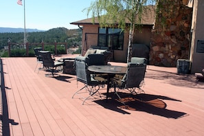 Huge deck at our hilltop home with gas fire pit, gas BBQ, and hot tub.