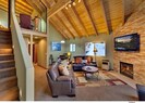 2nd Floor Den: Vaulted ceilings with exposed natural wood. Stairs to loft MBR #2