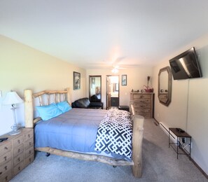 Main floor, queen bed, new mattress, loveseat pull out single sleeper, en-suite