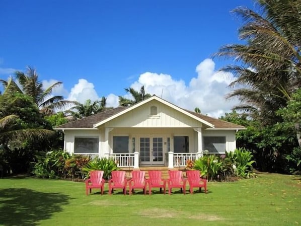 Sunrise Cottage welcomes visitors and invites you to sit and watch the ocean.