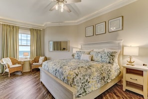 Master bedroom with King Sized bed, large walk-in closet and large bathroom with double vanities.