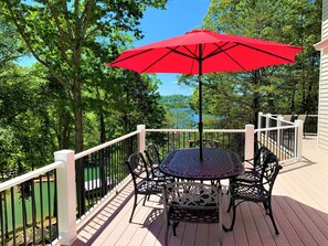 2 dining tables and chairs on the upper deck.