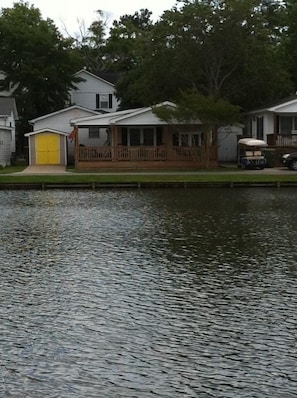 View from across the lake to the house