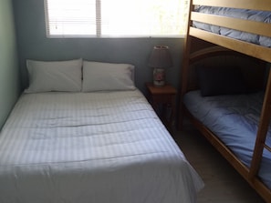 Second Bedroom with a full size bed and bunk bed with full size closet