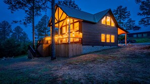 Dusk View of Cabin from lower area of the lot.