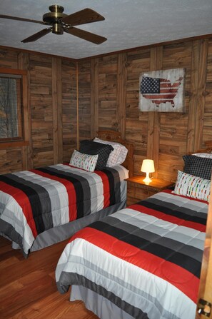 upstairs bedroom with double twin beds