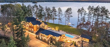 Breathtaking new Island Oasis retreat on Spooner Lake!