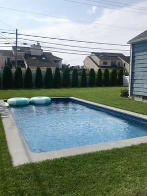 26x13 rectangular pool in backyard