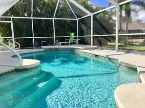 Sparkling pool with cascading waterfall,quiet and rejuvenating, this is paradise