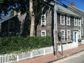street view including side yard hedge
