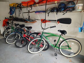 5 bicycles, equipment for water sports and safety gear for both. 