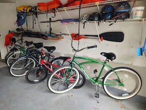 5 bicycles, equipment for water sports and safety gear for both. 