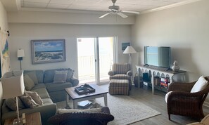 main living room leading out to the ocean front balcony