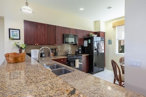 Kitchen has a breakfast bar