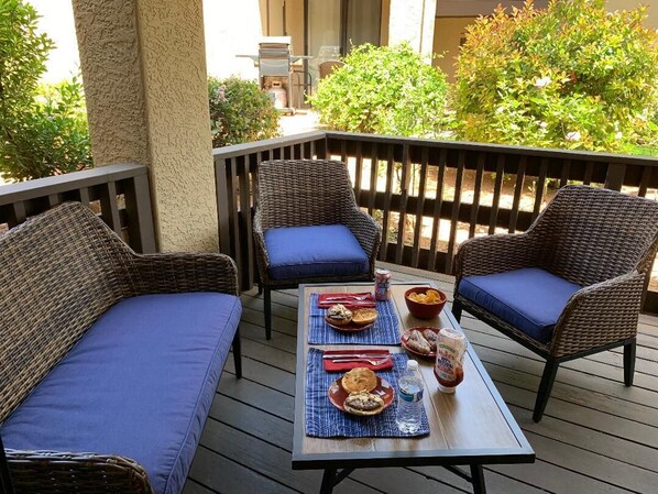 One of the two new wicker conversation sets on the outdoor decks.