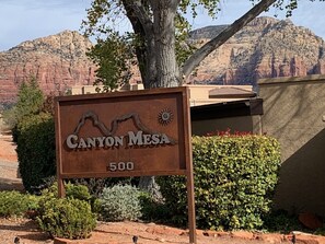 The main entrance to the gated country club.