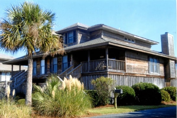 View of Duplex from the entrance road & marsh side