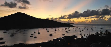 Sunrise Over Coral Bay From Your Private Deck At Coral Bayside Studio.