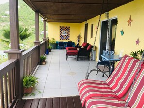 Private Deck w/ Luxurious Padded Chairs with Ottoman Foot Stools